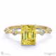 yellow lab grown diamond bubble drop side stone hidden halo emerald cut engagement ring yellow gold with 9k yellow gold metal and emerald shape diamond