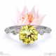 blushing bride yellow natural diamond bubble drop side stone round cut engagement ring platinum with platinum metal and round shape diamond
