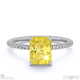 yellow lab grown diamond hidden halo radiant side stone engagement ring white gold with 18k white gold metal and radiant shape diamond